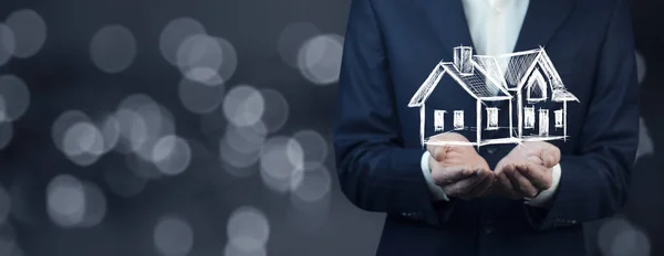 Young Man Hands Holding House Model Icon — стоковое фото