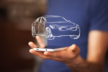 Ekranda araba modeli olan bir erkek cep telefonu.