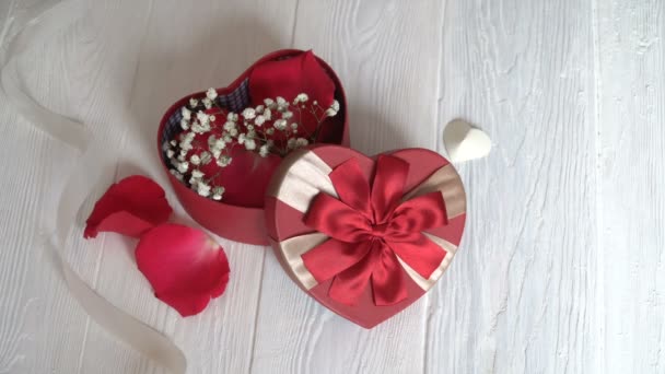 Gift Box Shape Heart Red Ribbon Wooden White Background — ストック動画