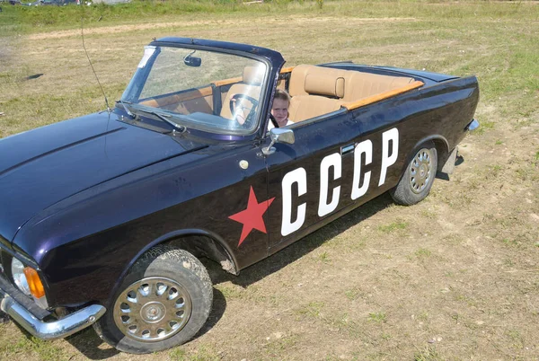 Child Sits Black Car Moskvich Convertible Inscription Ussr Exhibition Vintage — Stock Photo, Image