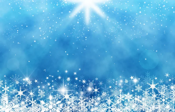 雪の結晶と母なる星と青のクリスマスの冬の背景 — ストック写真