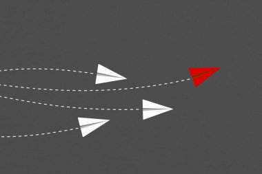 Liderlik ve rekabet konsepti, kırmızı kağıt uçak beyazlar arasında lider..