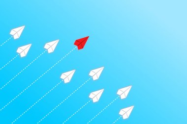 Liderlik ve rekabet konsepti, kırmızı kağıt uçak beyazlar arasında lider..