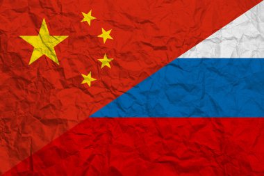 Çin-Rusya ilişkileri buruşuk kağıt arkaplanda bayrak sallıyor