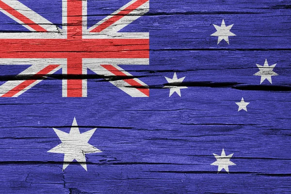 Australian flag on wood background, grunge style