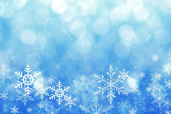 星と雪の結晶の装飾と青のクリスマスカードの背景 — ストック写真