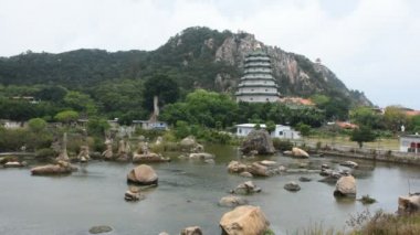 Peyzaj ve su Tiantan Bahçe tapınakta Tian Tan Bahçe çayır ve dağ ve hareketi Shantou City Chaozhou, Çin rüzgar dalga su ile