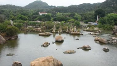 Peyzaj ve su Bahçe, Tian Tan Bahçe çayır ve dağ ve rüzgar Shantou, Çin için 7 Mayıs 2018 Shantou City'deki dalga su hareketi ile