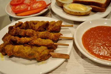 Tay insanlar hazırlama ve yaratıcı füzyon mutfak Oda Perth, Avustralya, yemek için yemek