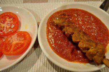 Tay insanlar hazırlama ve yaratıcı füzyon mutfak Oda Perth, Avustralya, yemek için yemek