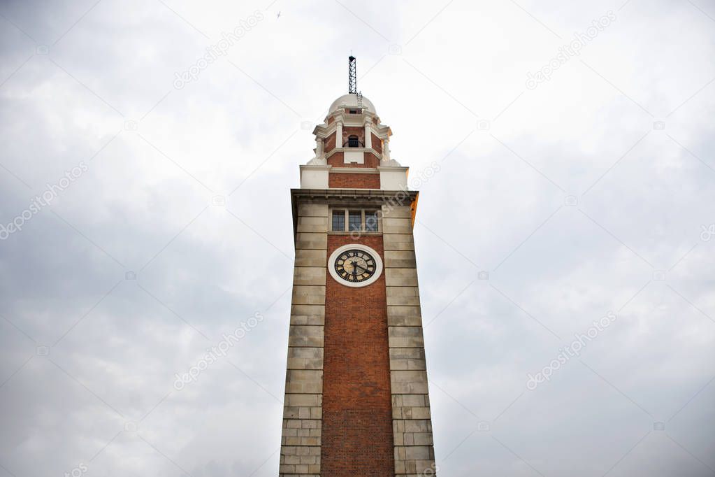 Former Kowloon-Canton Railway Clock Tower in Tsim Sha Tsui city at Kowloon island in Hong Kong, China for travelers travel and visit