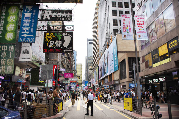 Chinese people and foreigner travelers walking visit and shopping on Sai Yeung Choi Street South in Mong Kok at Yau Tsim Mong on September 9, 2018 in Hong Kong, China