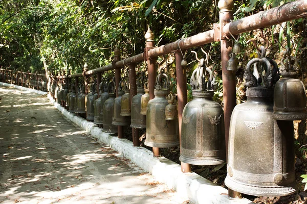 Many big metal bell at Wat Phra That Doi Tung in Chiang Rai, Thailand for Thai people and traveler foreigner travel visit and knock respect praying