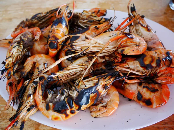 Grilled and roasted prawn or shrimp on dish plate at Cafe shop and restaurant in Phra Nakhon Sri Ayutthaya, Thailand