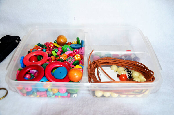 Colorful accessory jewelry bead plastic and leather for made DIY handmade and handicrafts in workshop thai style at Nonthaburi, Thailand