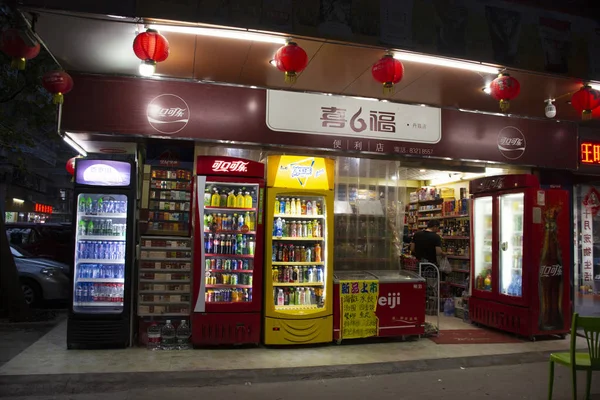 Local shop and soft drinks in refrigerant cabinet for sale chine — Stock Photo, Image