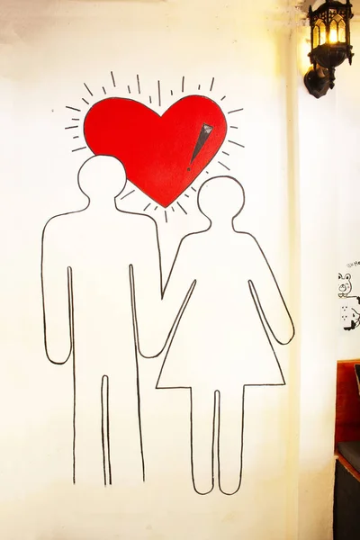 Art design dessin animé symbole de l'amour homme et femme sur le mur déco — Photo