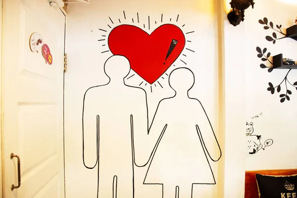 Art design cartone animato simbolo di amore uomo e donna sulla parete deco — Foto Stock