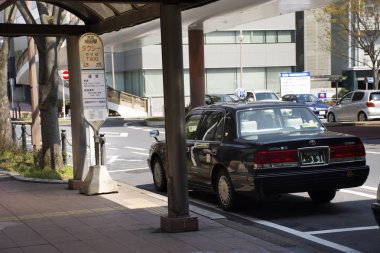 Japanese people driving taxi stop waiting travelers and passenge