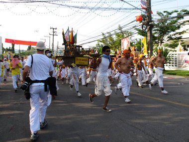 Shaman mediums thai people pilgrim join merit rite ritual medium invoker possession spirit of traditional chinese deity angel god goddess at Vegetarian Festival on October 20, 2012 in Phuket, Thailand