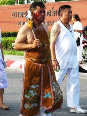 Shaman mediums thai people pilgrim join merit rite ritual medium invoker possession spirit of traditional chinese deity angel god goddess at Vegetarian Festival on October 20, 2012 in Phuket, Thailand