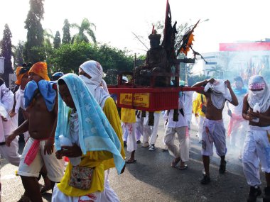 Shaman mediums thai people pilgrim join merit rite ritual medium invoker possession spirit of traditional chinese deity angel god goddess at Vegetarian Festival on October 20, 2012 in Phuket, Thailand