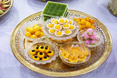 Antique nine auspicious thai desserts and local sweets snacks thai retro vintage style for ritual thai culture and traditional rite sacrificial offering to respect blessing holy in Ayutthaya, Thailand