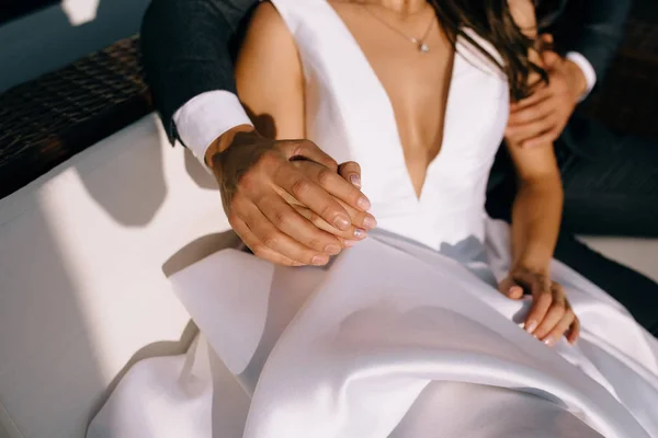 Closeup view of married couple holding hands — Stock Photo, Image
