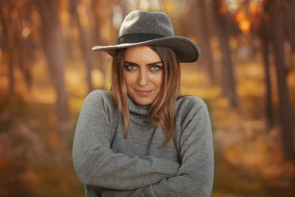 Woman under autumn trees, model photo, Fashion Shoot