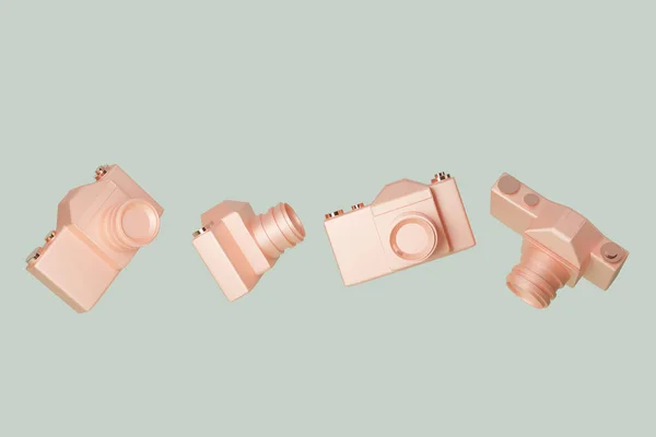 Vintage copper photo camera floating on pastel green background . Cameras at different angles, photography minimalist trendy concept. 3d illustration, 3d render with copy space