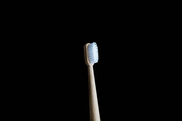 Bamboo Toothbrush on black background — Stock Photo, Image