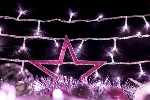 Adornos de Navidad con bolas de luces y estrellas — Foto de Stock