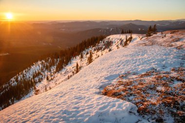 Sunrise at the Praire Mountain near Bragg Creek, Canada, Closest mountains to Calgary city, Praire mountain lookout in the winter time clipart