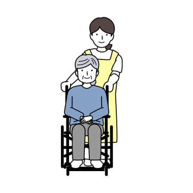 Bakıcı, tekerlekli sandalyedeki yaşlı birine yardım ediyor.