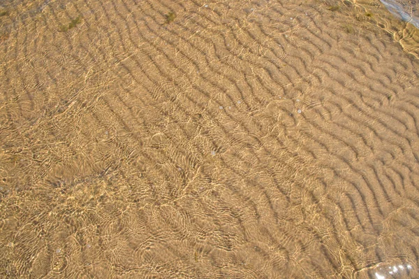 Padrão Ondas Areia Sob Água — Fotografia de Stock