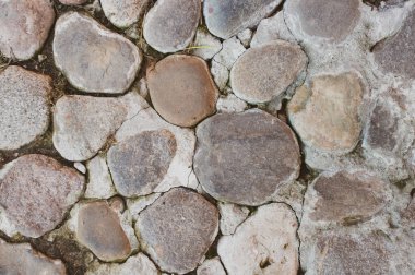 Sarı yapraklı gri taşın arka planı