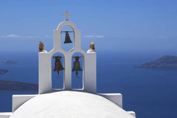 Classic Three Bells bell tower of a Greek church in Santorini