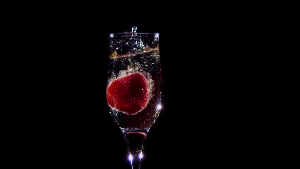 Fresh Strawberry Falling Glass Champagne — Stock Video