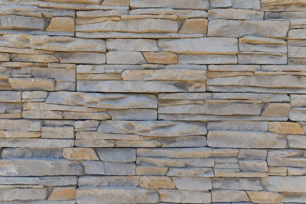 The texture of the wall of a variety of colored stones — Stock Photo, Image