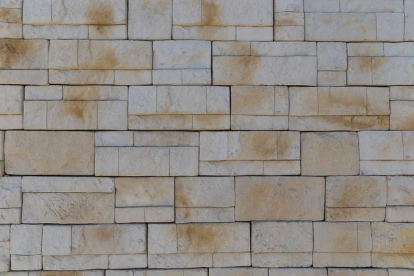 The texture of the wall of a variety of colored stones — Stock Photo, Image