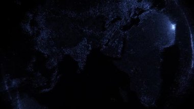 Siyah arka planda dönen partiküllerden oluşan dünya