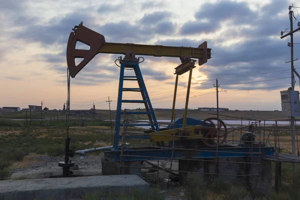 Oil rocking at sunset — Stock Photo, Image