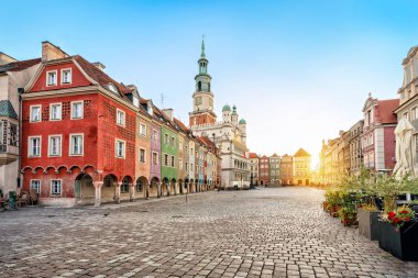 Stary Rynek square with small colorful houses and old Town Hall in Poznan, Poland clipart