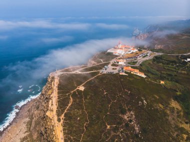 Beautiful aerial vibrant view of Capo Da Roca, the most western point of Europe, Portuguese municipality of Sintra, near Azoia, district of Lisbon, Serra de Sintra, Portugal, shot from dron clipart
