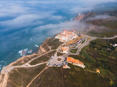 Beautiful aerial vibrant view of Capo Da Roca, the most western point of Europe, Portuguese municipality of Sintra, near Azoia, district of Lisbon, Serra de Sintra, Portugal, shot from dron clipart