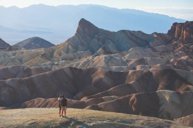 Vibrant panoramic summer view of Zabriskie point badlands in Death Valley National Park, Death Valley, Inyo County, California, US clipart