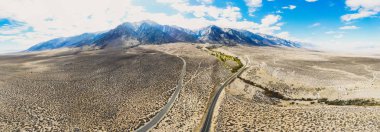 View of Lone Pine Peak, east side of the Sierra Nevada range, the town of Lone Pine, California, Inyo County, United States of America, John Muir Wilderness, Inyo National Forest, shot from dron clipart