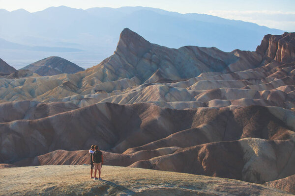 Vibrant panoramic summer view of Zabriskie point badlands in Death Valley National Park, Death Valley, Inyo County, California, US