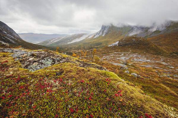 Norwegian mountain landscape during hiking to Halls Fortopp peak, with a view on Stetind, Northern Norway, Nordland county, municipality of Tysfjord, Ofoten, with fjord and lak