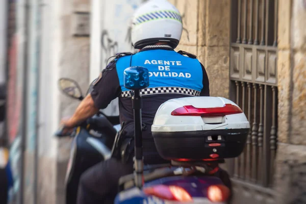 Spanish police squad formation on bike and motorcycle back view with \
